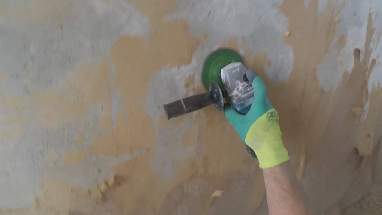Техника удаления старой краски с бетонных стен